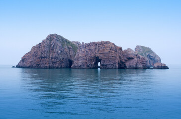 Doglibmun(Independence Gate) Rock on the sea at Hongdo Island of Dadohaehaesang National Park near Sinan-gun, South Korea