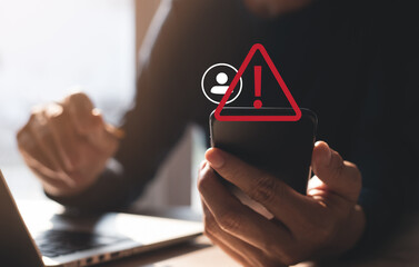 System hacked warning alert. Cyber security on mobile app. Man using mobile phone with warning...