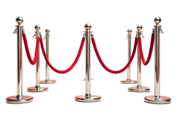 stanchions with red velvet ropes isolated on a white background