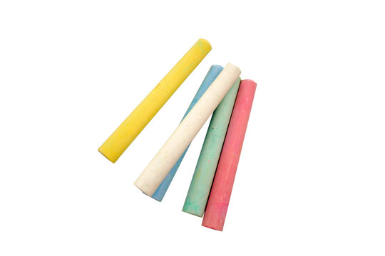 A bunch of colorful, yellow, white, blue, green and pink chalk sticks isolated on a white background