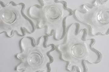 Set of Translucent Abstract Candle Holders on Table