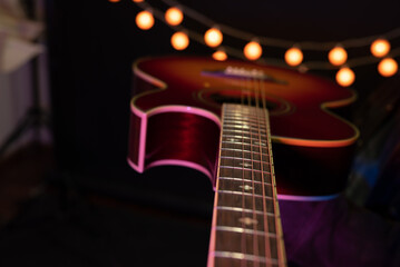 Rock musician playing acoustic guitar