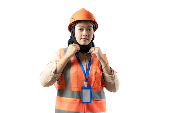 Young Asian female construction worker wearing hijab wearing construction safety helmet, industrial and construction concept, isolated on white background. - Powered by Adobe