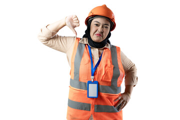 Young Asian female construction worker wearing hijab making a gesture of rejection while looking at the camera, gesture of rejection, industrial and construction concept, isolated white background.