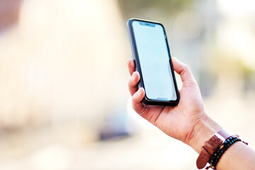 Hands, phone and mockup outdoor in city for travel directions, navigation app and destination map. Tourist, space and smartphone screen for connection, location or sightseeing on holiday or vacation