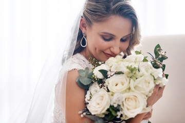 Naklejka premium Woman, bride and wedding day for marriage with bouquet for vows, reception and commitment in future. Female person, celebration and flowers for love, happiness and gratitude as excited for honeymoon