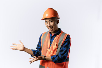 Fototapeta premium contractor or miner. friendly, welcome gesture. industrial and mining concept. isolated white