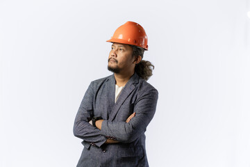 optimistic mens expressions and gestures thinking. stylish asian man with suit and orange helmet on white background. construction or mining business concept photo