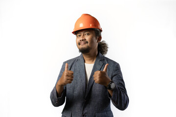 the happy expression of a boss thumbs up. stylish asian man with suit and orange helmet on white background. construction or mining business concept photo 