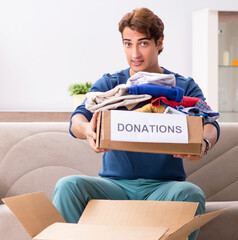 Concept of charity with donated clothing