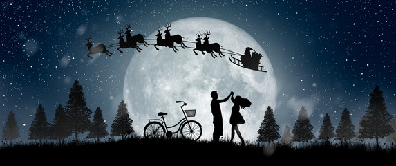 Silhouette of Santa Claus at night Christmas with couple dancing under the full moon.