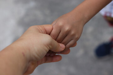 parent and child hands.