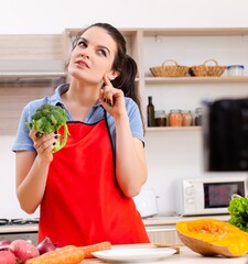 Young female vegetarian recording video for her blog