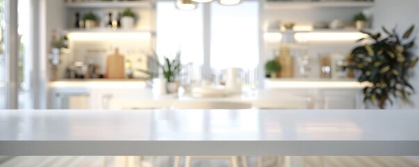 An empty kitchen counter with a modern and clean design, sunny window in the background, space for display.