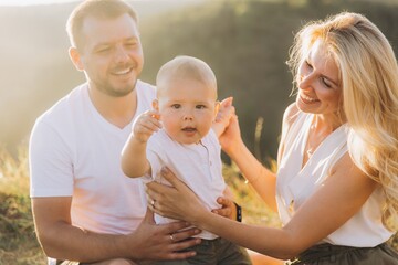 Happy Family Enjoying Quality Time Outdoors in Warm Sunlight