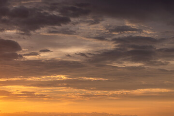 Obraz premium Dramatic sunset sky colorful with majestic orange sunlight clouds ,Toulouse France