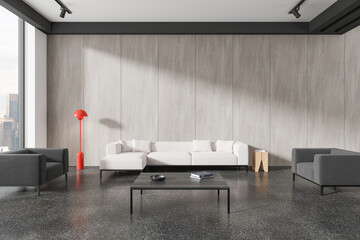 Stylish home living room interior with sofa and armchairs, panoramic window