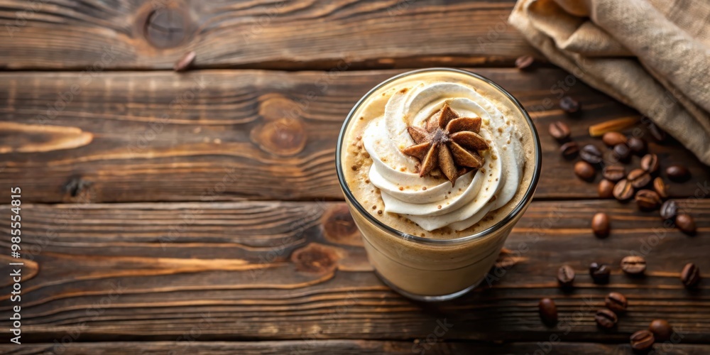 Poster top view of a creamy frappe coffee on a wooden table with copy space