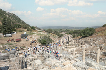 tourists visiting the ancient city of Ephesus, Old Ruins of the ancient Greek city in Selcuk, UNESCO. Efes Izmir Turkey