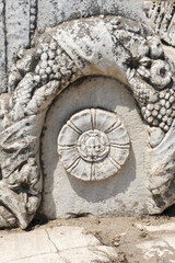 View of ruins surrounding the Library of Celsius from the Marble Street in ancient Ephesus Turkey