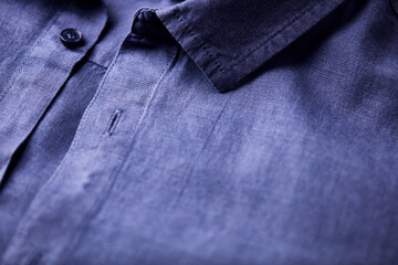 Close up of men's linen shirt. Soft focus.	