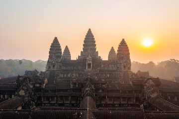 Aerial view of Angkor Wat Temple close-up shot with sunrise in the background
