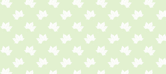 White autumn leaves in the green background