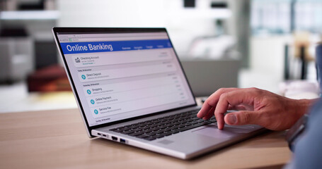 Checking Bank Account On Laptop