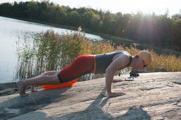 Scandinavian man warming up before swimming in the baltic sea