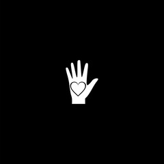 Obraz premium Heart on hand icon isolated on dark background