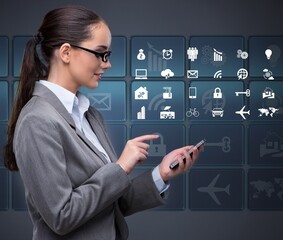 Businesswoman with mobile in business concept