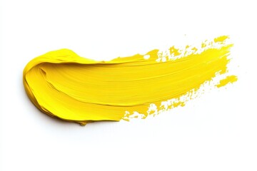 A vibrant yellow paint stroke on a white background, showcasing color and texture.