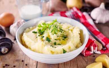 Bowl of Mashed Potatoes with Butter, Cream, and Herbs – Creamy Comfort Food