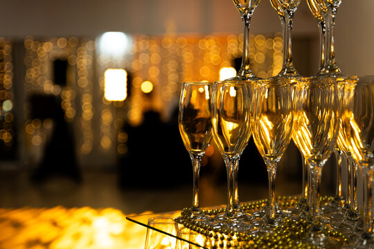 Tower of champagne glasses during the celebration of an important event