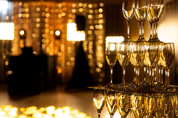 Tower of champagne glasses during the celebration of an important event