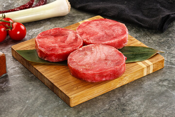 Delicous raw tuna medallion for cooking
