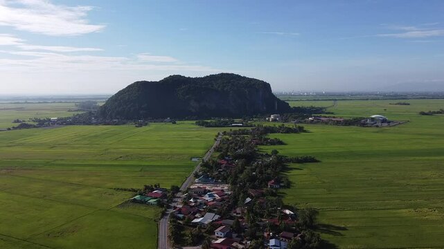 Stunning aerial footage of Gunung Keriang, a majestic limestone hill located in Kedah, Malaysia. 