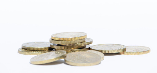 Coins stacked on white background