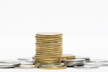 Coins stacked on white background