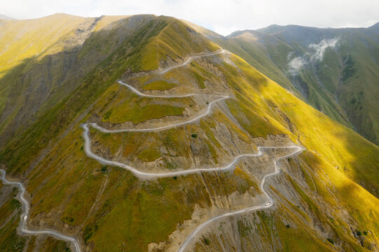 Aerial view of mountain winding road in Tusheti, Georgia. Abano pass. One of the most dangerous road on the world. High quality photo