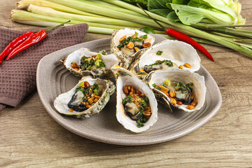 Baked oysters with green onion