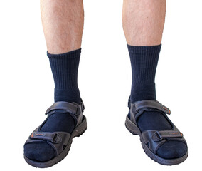 Man legs wearing black socks with sandals isolated.
