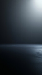 dark minimalistic background with soft light creates serene atmosphere, perfect for various design projects. subtle gradients and textures evoke sense of calm and depth