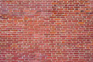 Red brick wall backgrounds. Old brickwork texture. Rock block pattern. Vintage stonewall. Abstract grunge urban design. Textured surface building.