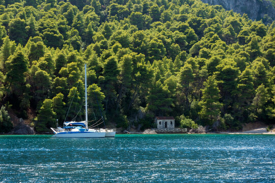 Amazing scenery by the coastline in Kalamos island, Greece, with yachts and boats