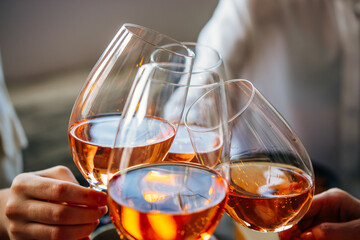 Glasses of rose wine seen during a friendly party of a celebration.