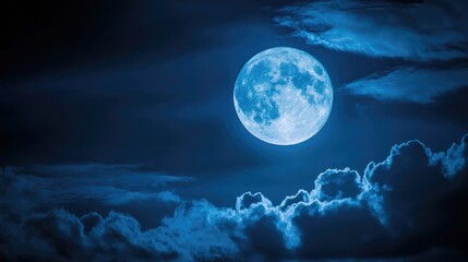 Fototapeta premium Full moon in dark skies with clouds