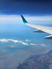 view land and sea from airplane window