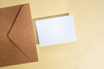 Paper envelopes on a light background. New mail, write a message. Send and receive mail. Postal delivery service. Empty envelope, empty space. Communication with people, paperwork. Envelope close-up