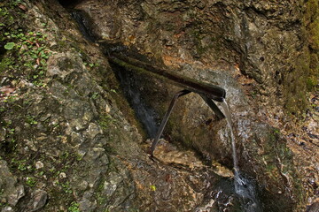 Water spring in Wolfsklamm at Stans, Austria, Europe
